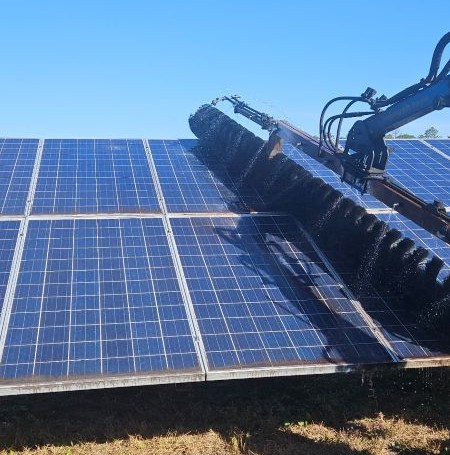 Utility scale solar panel cleaning